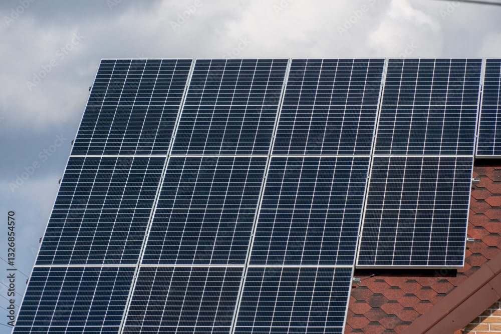 Solar panels capture sunlight to generate electricity for a home, showcasing sustainable energy solutions in a modern suburban area on a clear day Solar panels capture sunlight to generate electricity for a home, showcasing sustainable energy solutions in a modern suburban area on a clear day