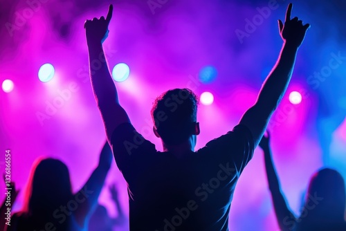 Dynamic Concert Scene with Colorful Lights and Energetic Crowd