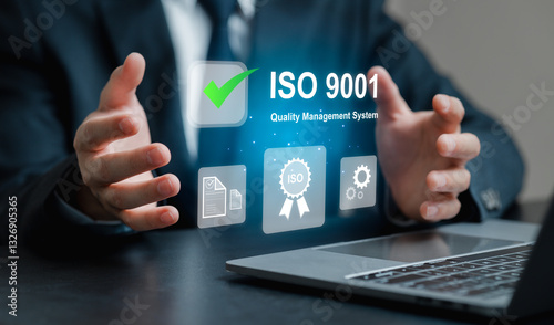 Businessman Presenting ISO 9001 Quality Management System Concept