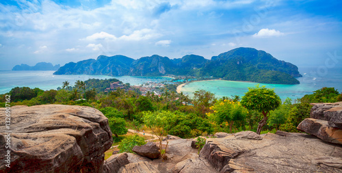 Obraz na płótnie Phi-Phi island viewpoint Krabi Province, Thailand. Famous Koh Phi-Phi Don island with white sand beach and turquoise water under blue sky. Panoramic view of Phi Phi island in Krabi, Thailand w salonie