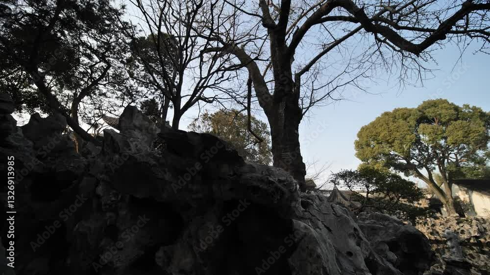 Walking through the ancient architecture and rockery landscapes of Suzhou Gardens in China. High quality 4k footage Walking through the ancient architecture and rockery landscapes of Suzhou Gardens in China. High quality 4k footage