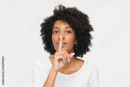 Fotografija Serious african american woman black girl female afro student holding finger on