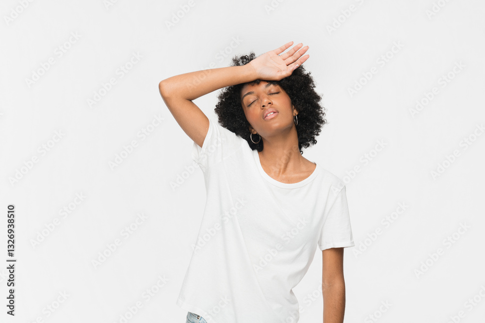 Closeup portrait of young african woman girl worried having high blood pressure, suffering from headache migraine massaging temples in period illness, feeling stress isolated on white background Closeup portrait of young african woman girl worried having high blood pressure, suffering from headache migraine massaging temples in period illness, feeling stress isolated on white background