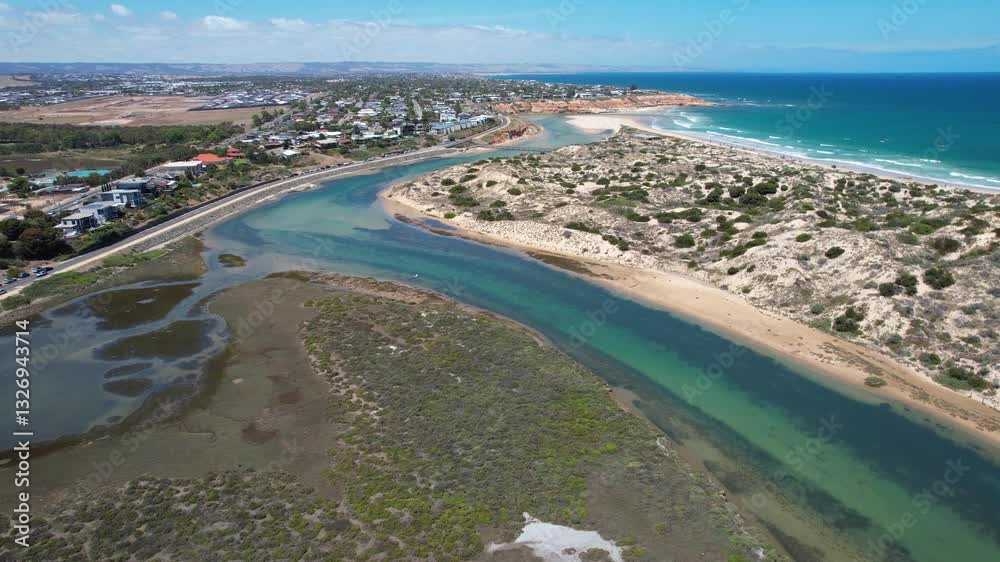 Aerial view of Onkaparinga River Ngangkiparri with sandy beach and coastal vegetation, Port Noarlunga South, South Australia, Australia. Aerial view of Onkaparinga River Ngangkiparri with sandy beach and coastal vegetation, Port Noarlunga South, South Australia, Australia.