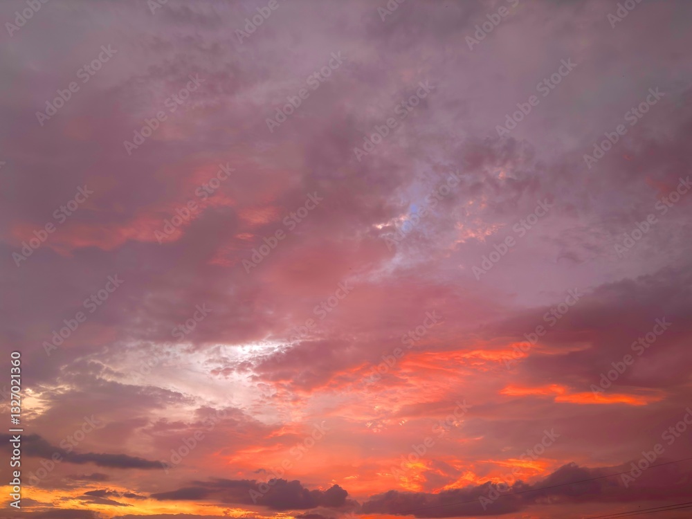 Beautiful sky with natural gradations. Thick clouds in the dusk sky on a winter night. Image of a cloudy sky in the afternoon. View of the night sky with golden light from the evening sun Beautiful sky with natural gradations. Thick clouds in the dusk sky on a winter night. Image of a cloudy sky in the afternoon. View of the night sky with golden light from the evening sun