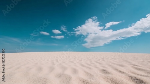 Vast sandy desert landscape under a brilliant blue sky with scattered clouds creating an open and airy atmosphere : Generative AI