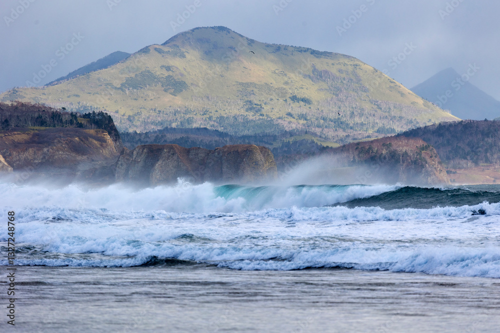 Pacific Ocean coast, rocks and waves. Kunashir. South Kurils Pacific Ocean coast, rocks and waves. Kunashir. South Kurils