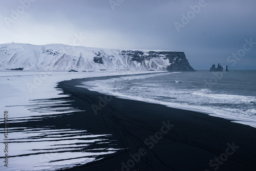 View of Reynisfjara beach and surrounding area from Dyrholaey viewpoint (South Iceland) photo