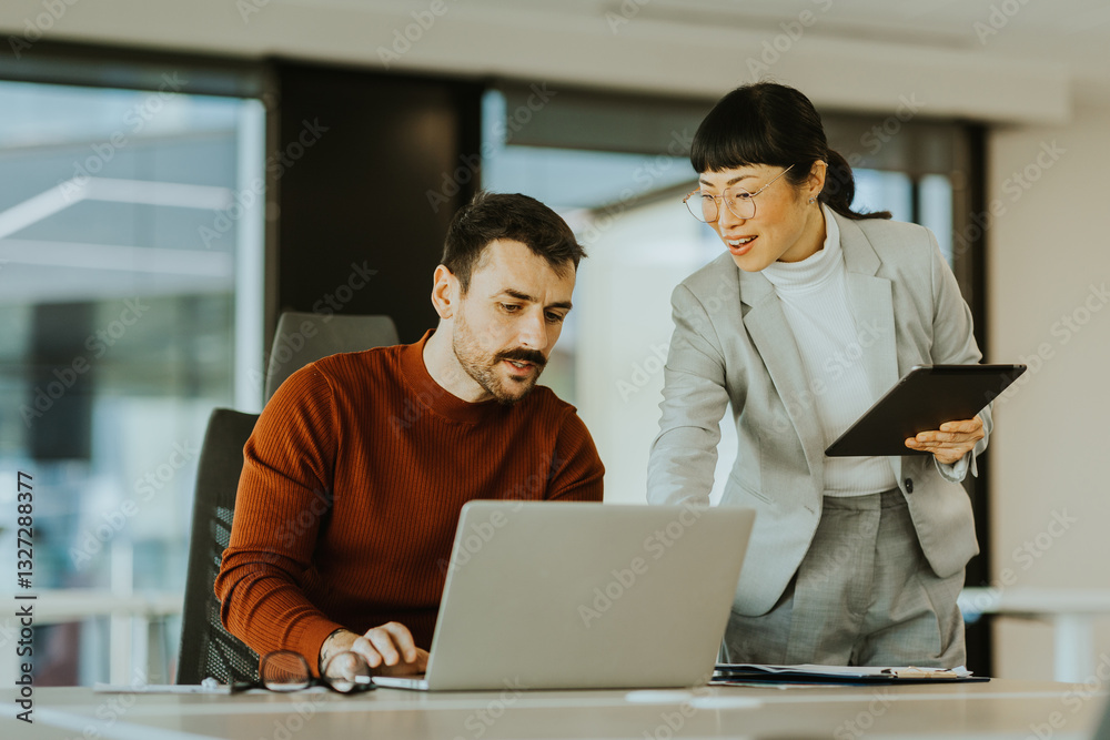 Collaborative teamwork in a modern office environment during a productive workday Collaborative teamwork in a modern office environment during a productive workday
