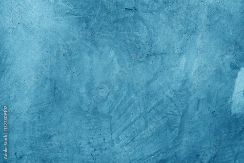 blue background of blue plaster with scuffs and unevenness