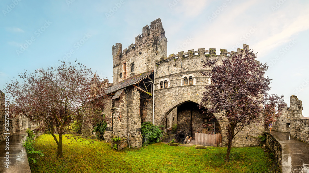 External view of the medieval stone walls of the Castle of the Counts (Gravensteen) in Ghent, Belgium External view of the medieval stone walls of the Castle of the Counts (Gravensteen) in Ghent, Belgium