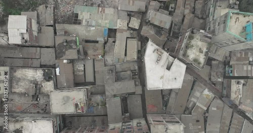 Aerial view of densely populated urban landscape with rooftops and buildings, Dhaka, Dhaka Province, Bangladesh.