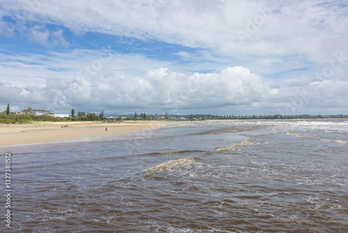 Wallpaper Mural Aerial views of muddy waters from Cudgen Creek after Cyclone Alfred flowing in to the sea at Kingscliff headland seawall along the east coast of New South Wales, Australia Torontodigital.ca