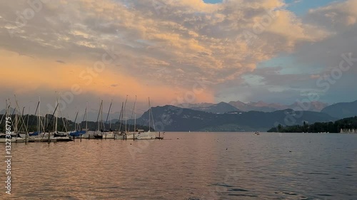 Sailboats on Lake Lucerne at sunset, Switzerland landscape