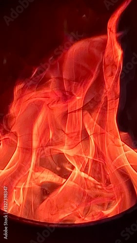 Small Flame, Nearby Lisri, in the mountainous region of North Ossetia, a bonfire blazes as part of a tower complex. At night, logs crackle and burn, providing warmth and light for campers surrounded.