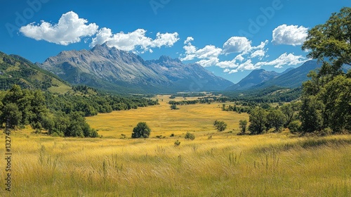 Golden valley nestled amidst majestic mountains under a vibrant sky