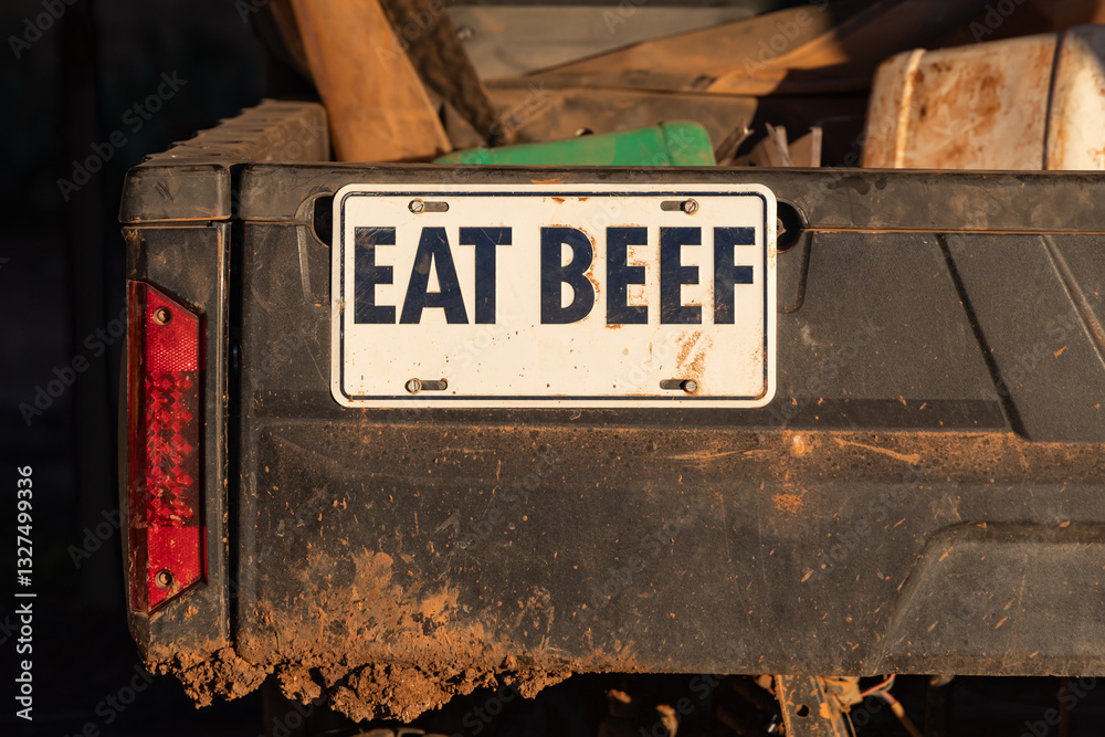 License plate saying, 'Eat Beef' on a pickup truck.