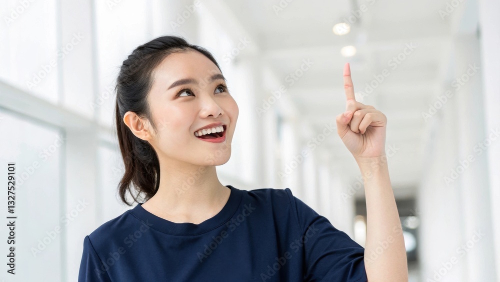 A Young Womans Bright Idea, A Joyful Expression Of Inspiration And Discovery In A Modern Hallway Setting With Soft, Natural Light A Young Womans Bright Idea, A Joyful Expression Of Inspiration And Discovery In A Modern Hallway Setting With Soft, Natural Light
