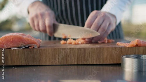 Wallpaper Mural Chef slices fresh salmon with precision, reflecting culinary artistry. Elevated cooking techniques paired with fine ingredients inspire unforgettable flavors. A moment of mastery. Close up. Torontodigital.ca