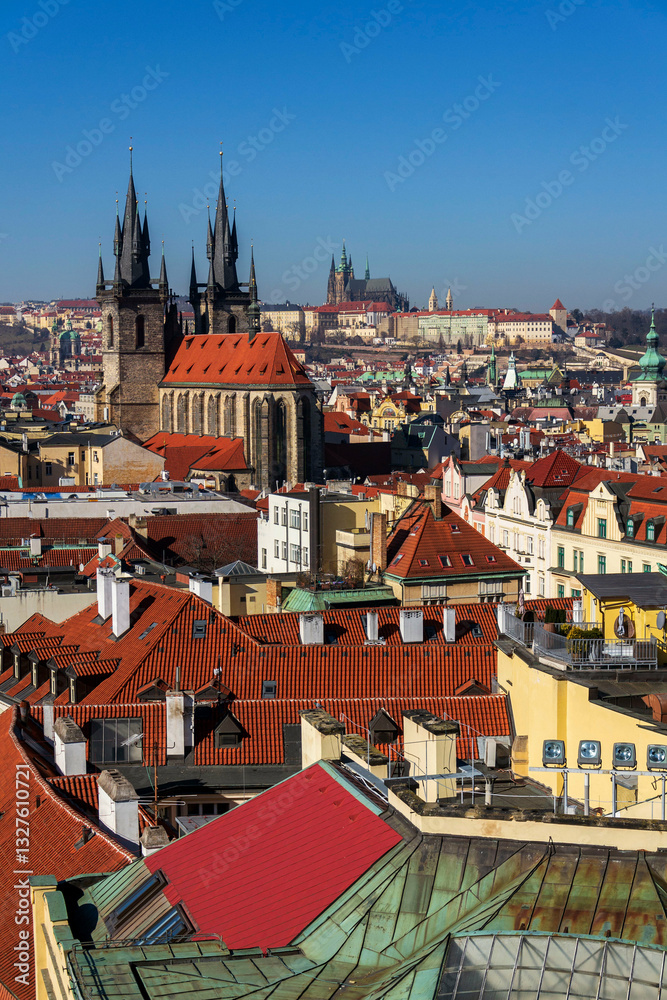 Fototapeta premium Gothic Church of Our Lady before Tyn with St. Vitus Cathedral and Prague Castle in background, Prague, Czech Republic, sunny day