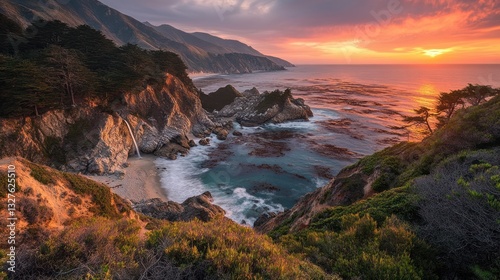 Mcway falls cascades onto beach under vibrant california sunset