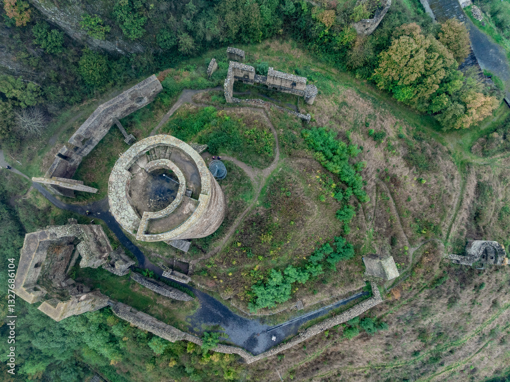 Aerial ground plan view of Philipsburg castle above Monreal Germany with pentagonal tower and large round keep