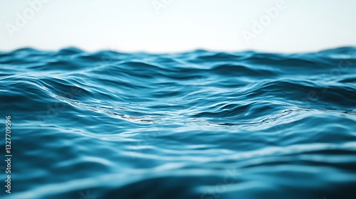 Fototapeta Naklejka Na Ścianę i Meble -  Calm blue ocean water surface with gentle waves under clear sky