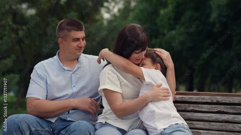 man woman with child kid bench hugging, child hugging mother outdoors, man hugging relatives, mother parent hugging child kid son boy, woman man son kid outdoors, family walk nature, concept happy man woman with child kid bench hugging, child hugging mother outdoors, man hugging relatives, mother parent hugging child kid son boy, woman man son kid outdoors, family walk nature, concept happy