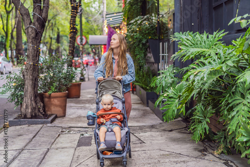 Obraz na płótnie Mother with her son exploring lush streets of Condesa, Mexico City. Family adventure in a vibrant urban oasis. Travel, family bonding, and urban greenery concept in Latin America w salonie