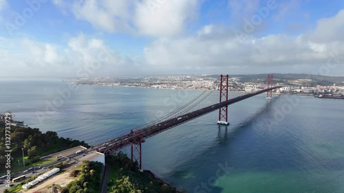 Beautiful view of the 25 de Abril suspension bridge in Lisbon, vacation hotspot
