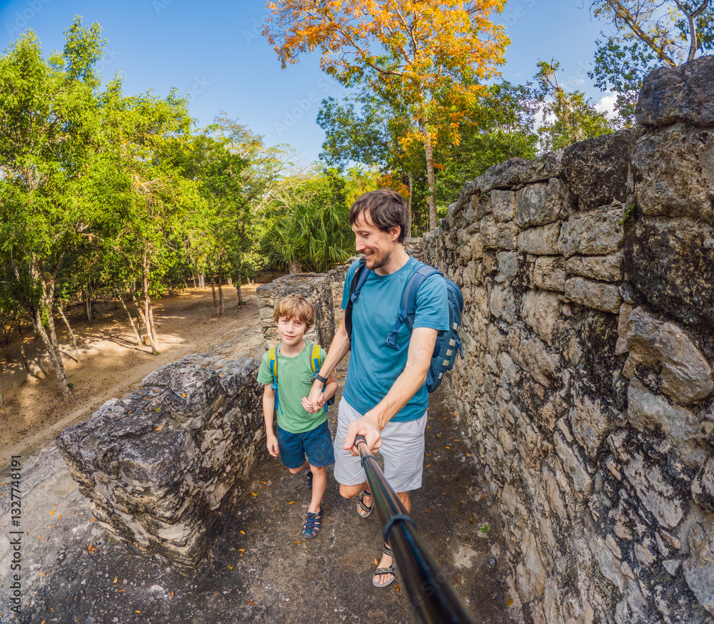 Father and son tourists exploring the ancient ruins of Coba, Mexico. Family bonding, cultural heritage, and adventure travel concept in the Yucatan Peninsula