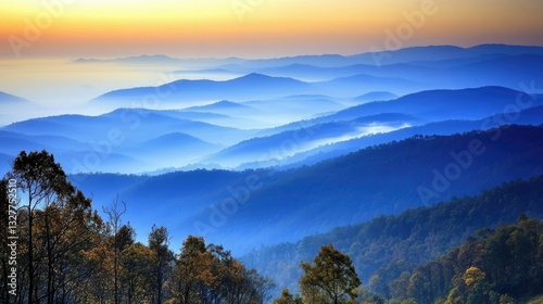 Misty mountain range at dawn