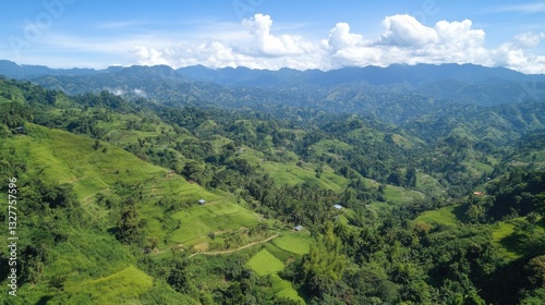 Lush Green Mountain Landscape with Rolling Hills and Clouds