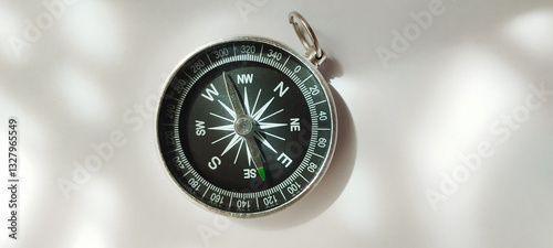 Navigating with a compass exploring directional tools outdoor adventures photography natural light close-up perspective
