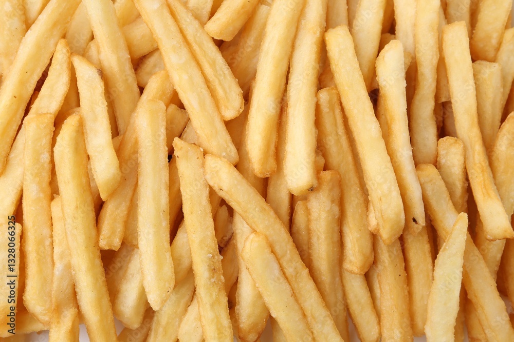 Pile of delicious French fries as background, top view Pile of delicious French fries as background, top view