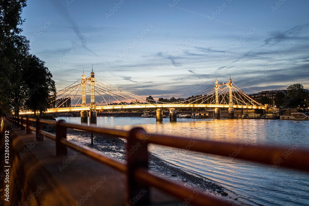 Fototapeta premium London, UK - September 14, 2023: Long Exposure shot of light Albert Bridge at night