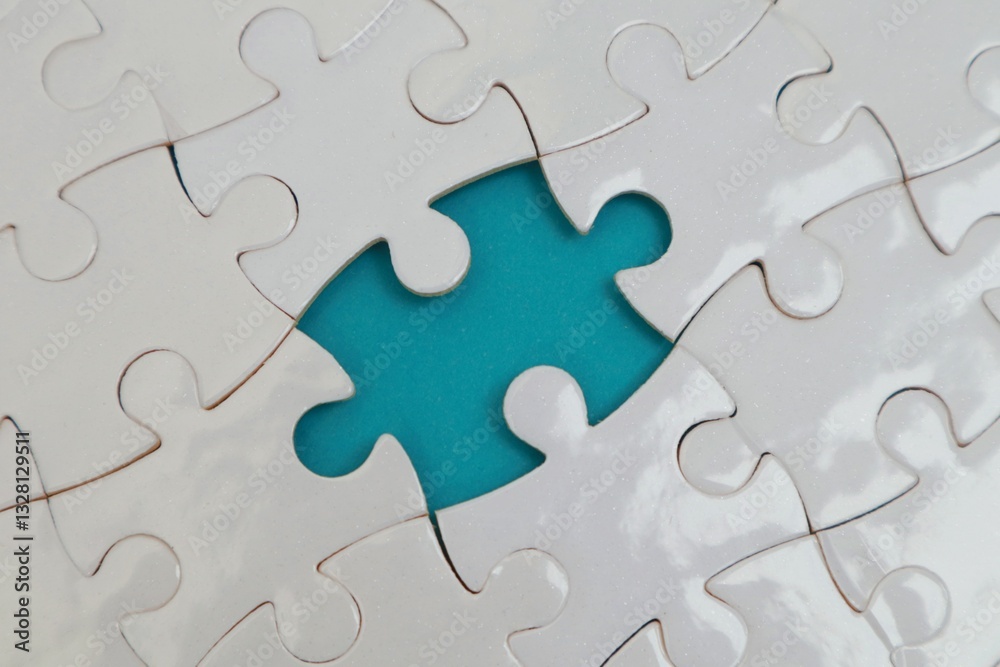 Incomplete white puzzles with blue backgrounds Incomplete white puzzles with blue backgrounds