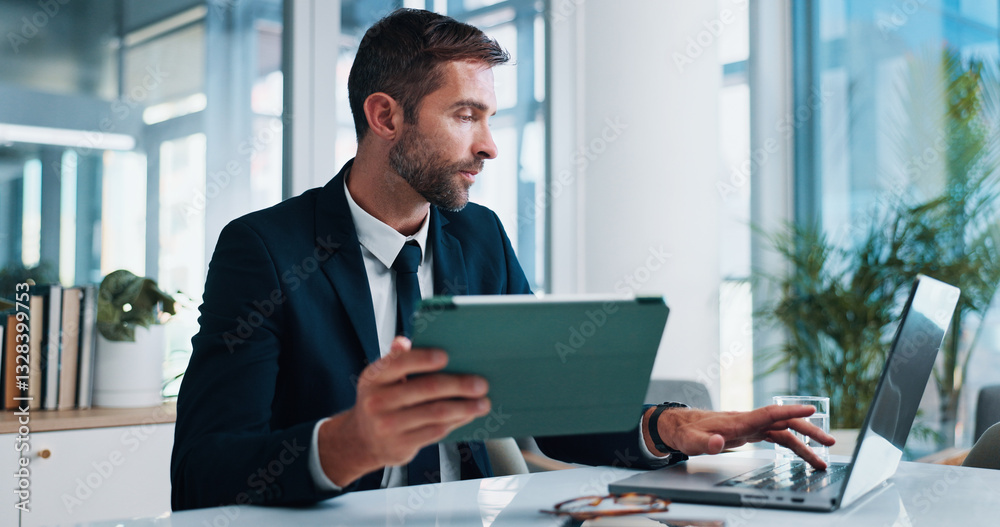 Businessman, tablet and laptop in office with typing, review or research for finance, budget or stock market. Person, digital touchscreen and click on application with stats, growth and investment Businessman, tablet and laptop in office with typing, review or research for finance, budget or stock market. Person, digital touchscreen and click on application with stats, growth and investment