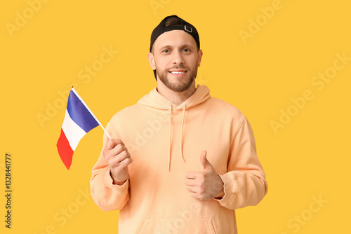 Young man with flag of Fran...