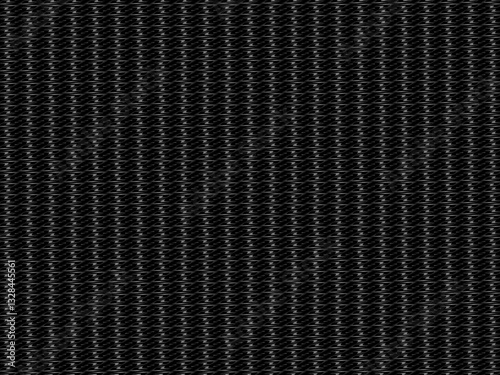 Black metal texture steel background. Perforated metal sheet. Texture of black carbon fiber.