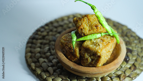 Delicious stuffed thu served with green chili on a wooden plate