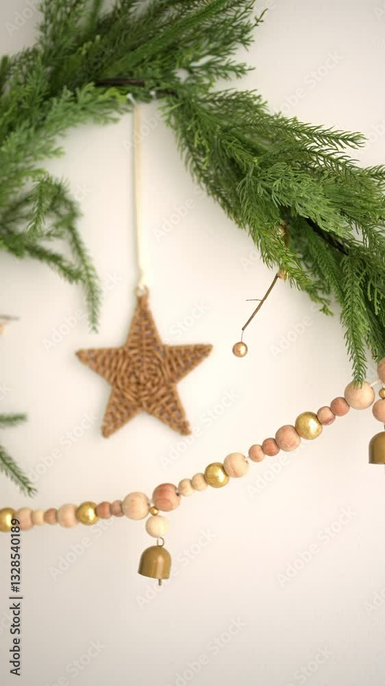 Rustic Christmas decor with greenery, wooden beads, and bells