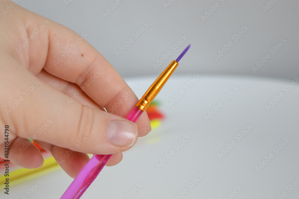hand holding a set of colorful paintbrushes different shapes sizes art craft painting supplies creative workshops educational content creative inspiration motivational artistic painting tools lively hand holding a set of colorful paintbrushes different shapes sizes art craft painting supplies creative workshops educational content creative inspiration motivational artistic painting tools lively