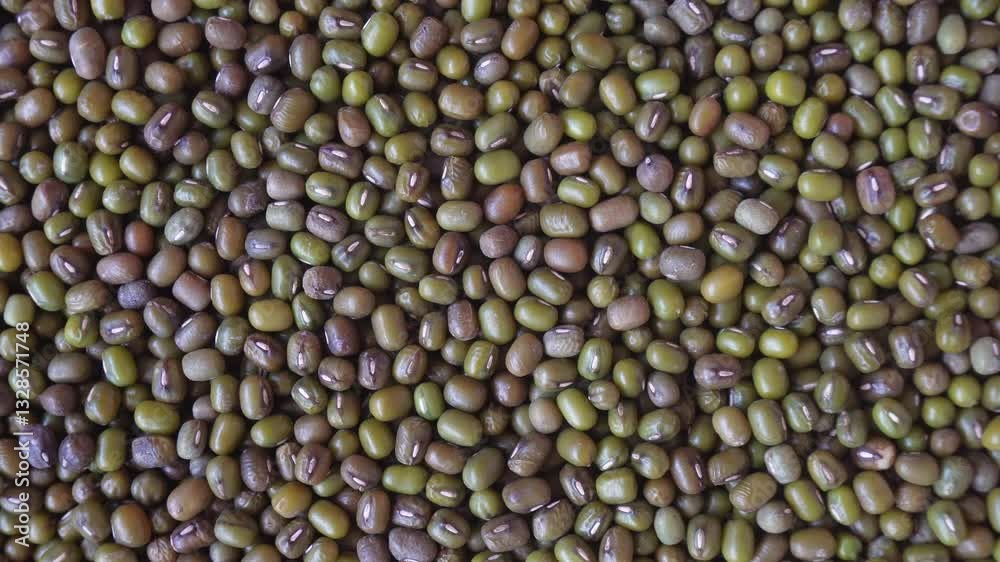 Rotating raw mung bean seeds. Healthy food ingredients Rotating raw mung bean seeds. Healthy food ingredients