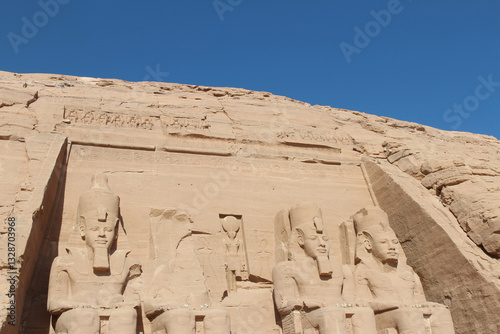 Four colossal statues of a seated Ramses II at entrance of the Great Temple of Abu Simbel, Egypt photo