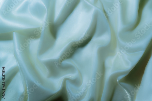 Elegant Light Blue Satin Fabric with Soft Folds – Abstract Texture