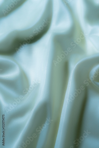 Elegant Light Blue Satin Fabric with Soft Folds – Abstract Texture