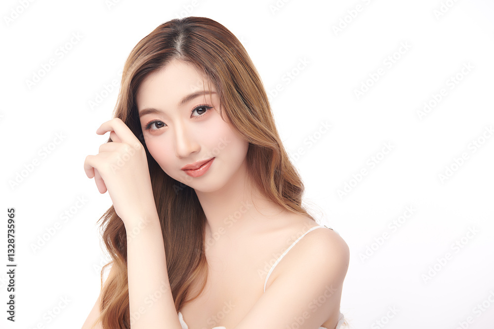 A beautiful young Asian woman with clean, fresh skin against a white background. She represents beauty, skincare, and spa treatments. A beautiful young Asian woman with clean, fresh skin against a white background. She represents beauty, skincare, and spa treatments.