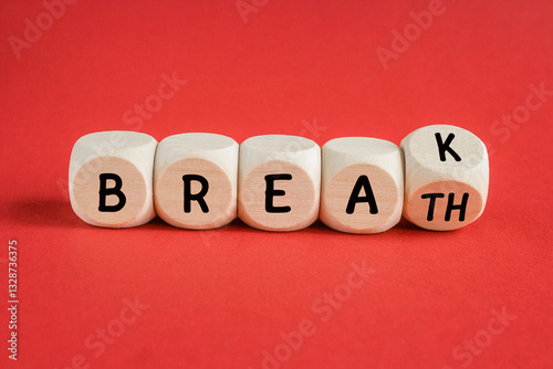 Breath or break symbol. Turned dice and changes the word breath to break. Beautiful red background. Medical, lifestyle and breathe and break concept.