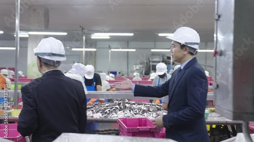 Asian business men at factory.Business, Factory Manufacturing, and Management, Inspection Technology and Safety